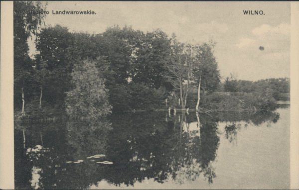 Vintage postcard showing a wooded lakeshore mirrored in still water, captioned Lentvaris lake and Vilnius